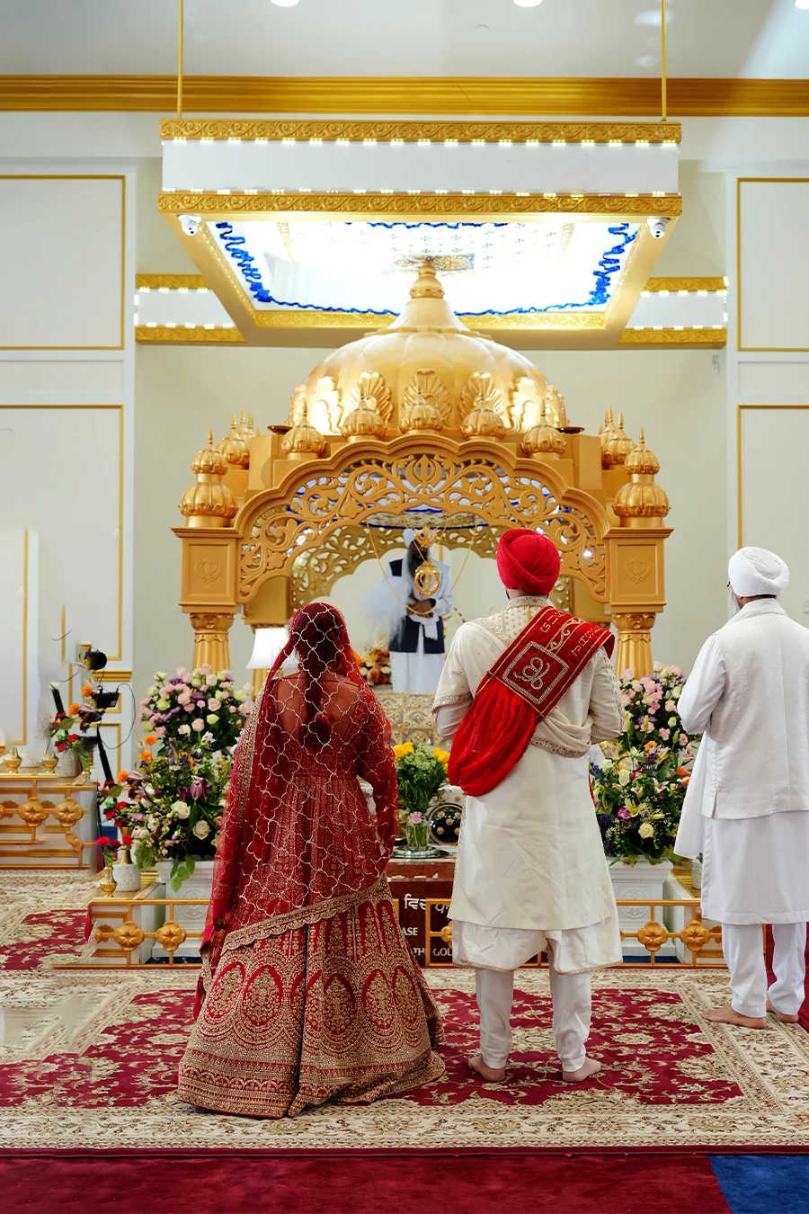 Punjabi bride and groom portrait in traditional attire