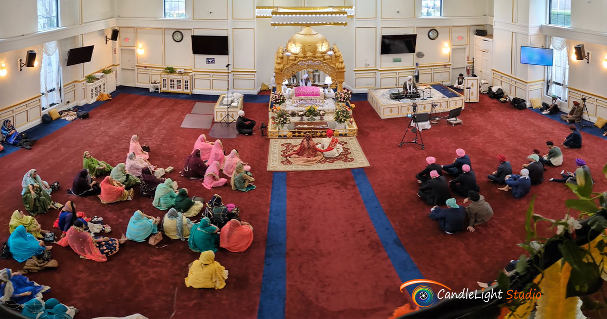 Gurjit and Jaspreet were seated during their Anand Karaj ceremony at the Guru Gobind Singh Sikh Center, surrounded by family and sacred hymns.